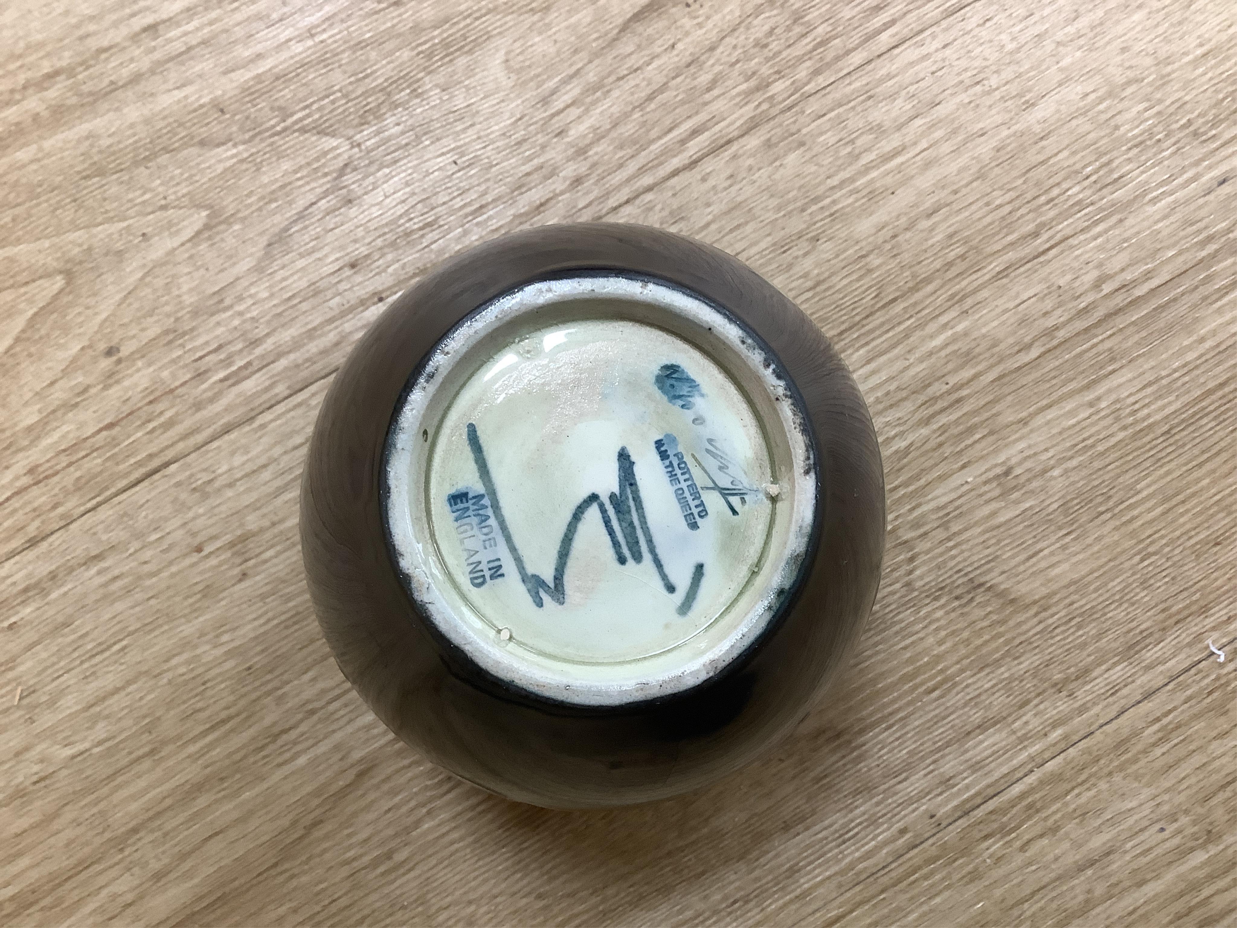 Three Moorcroft vases and a Moorcroft Hibiscus jar and cover, largest 25cm high